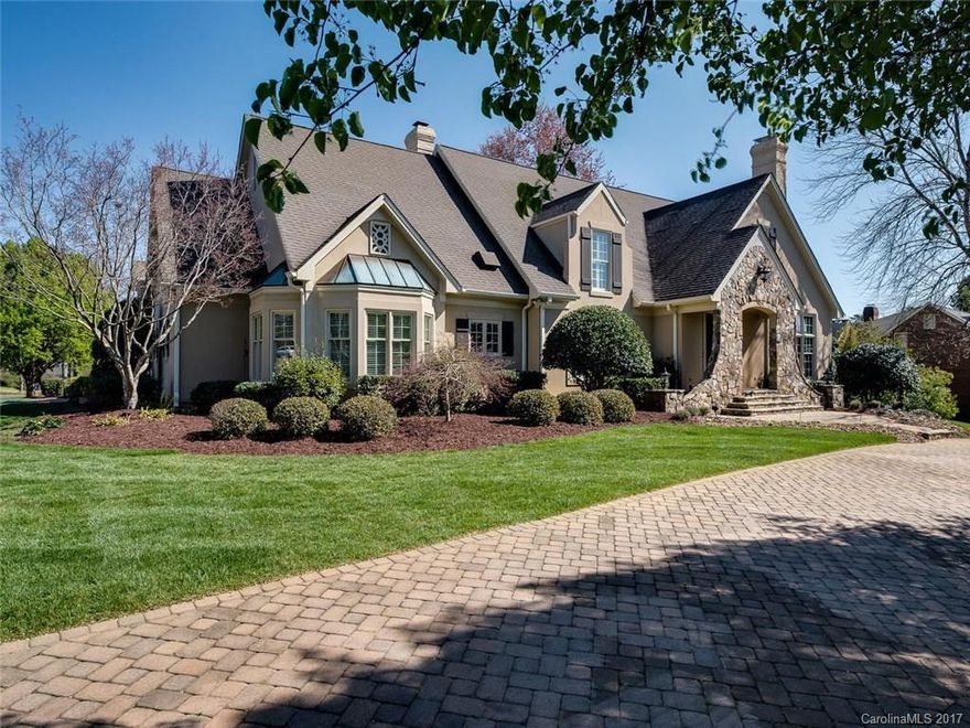 Absolutely stunning! Unique combination of style and comfort. Soaring entrance, high ceilings, beautiful floors. Fabulous eat in kitchen with large island, panelled library, wine room opening to covered terrace with fireplace. Master suite with large walk-in closet and custom bath. Upper level bedrooms have ample closet space and recent bathroom renovations. Two laundry rooms. Multi-purpose flex space and large bonus room. Oversized 3 car garage and private, flat backyard.