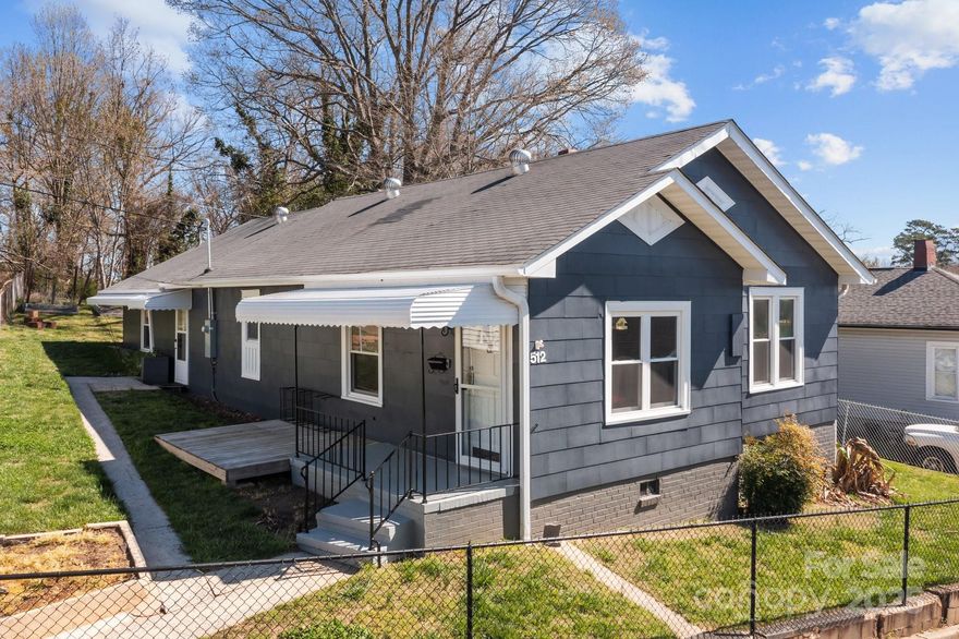 Welcome to this beautifully remodeled 1925 home, perfectly situated in the heart of Cramerton! Offering 3 bedrooms and 2 full baths, this home seamlessly blends historic charm with modern updates.

Step inside to find a thoughtfully renovated interior featuring original character with updated fixtures. The spacious living area is filled with natural light, while the updated kitchen boasts stainless steel appliances, quartz countertops, and ample cabinet space. The primary suite offers a peaceful retreat with a private ensuite bath, and the additional bedrooms provide plenty of space for family, guests, or a home office.

Located just across the street from Town of Cramerton Central Park and less than a mile from Goat Island Park and Greenway, this home is ideal for outdoor enthusiasts and those who love a vibrant community atmosphere. Enjoy easy access to walking trails, playgrounds, and local dining while being just minutes from downtown Belmont and a short drive to Charlotte.