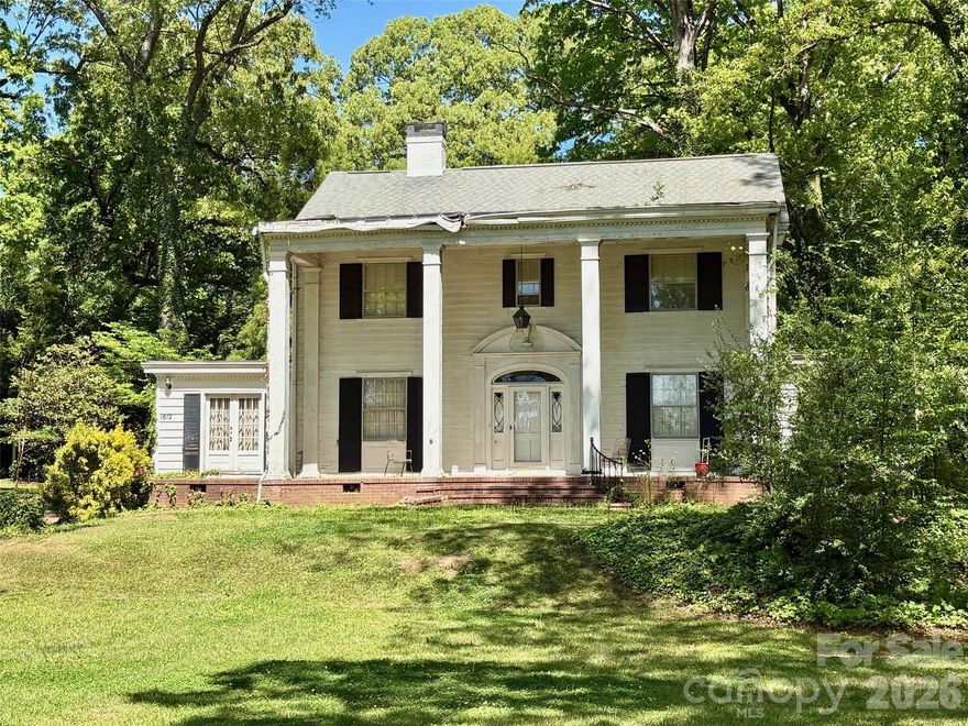 Take a step back in time to this stately 4 bed 3.5 bath colonial style home sitting on 3 acres in town! The main floor of this home features a large living room, den, study, kitchen, breakfast room, mud room w/ laundry, formal dining room and a half bath. Upstairs features the primary suite, three additional bedrooms and three full baths. Interior features include beautiful hard wood floors, two fireplaces and so much more. This home also features an upper and lower garage apartments that would make it perfect for multi generational living or rental income. The top apartment is 966 sq ft and is a 2 bed 1 bath, the bottom is 398 sq ft with 1 bed 1 bath. This home is being sold as-is and needs some work and restoration, however it truly is a gem that is ready to be restored to its former glory!