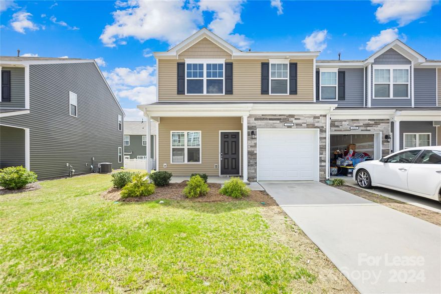 Like new 2-story townhouse, constructed in 2019, offers 2 bedrooms and 2.5 bathrooms spanning 1644 sqft, including a 1-car front-entry garage in Steele Creek's Wrights Crossing. The first floor features a dining area, kitchen, family area, and a half bath. On the second floor, you'll find a spacious master bedroom with a walk-in closet and master bathroom, a second bedroom, a full hallway bathroom, a sizable loft, and a laundry room.

Discover Steele Creek's attractions, such as shopping at Charlotte Premium Outlets and Rivergate shopping district. Nearby Ayrsley offers dining and entertainment, with easy access via I-485 and I-77, while the close proximity to Lake Wylie adds to the appeal.

Rent covers HOA fees, lawn maintenance, refrigerator, washer, and dryer. Tenant responsibilities include water, gas, and electricity. Community amenities include an outdoor pool. Applicants over 18 must undergo credit/background checks, provide proof of funds, and pay application fees.