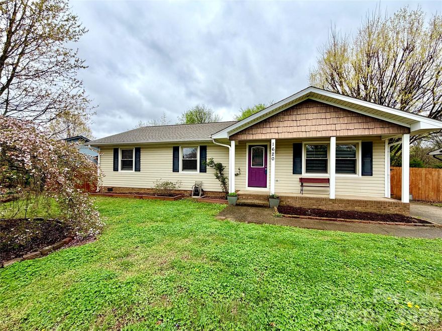 Absolutely fantastic renovated ranch within walking distance of Camp North End, NC Music Factory & minutes from Uptown! Home has a freshly painted interior & boasts an open concept with new carpet in 3 bedrooms including primary (LVP in 4th BR). New roof April of 2022 & newer heat pump/AC 2019. Modern updates include bamboo hardwood flooring, tankless water heater, solar panels & upgraded lights/switches/outlets. Renovated kitchen features stainless steel appliances (including refrigerator), large kitchen island, tile backsplash & custom cabinets. No HOA! The primary bedroom features an ensuite bath with granite flooring, custom slate shower & walk-in closet. Covered 12x16 deck overlooks private fenced backyard. A rare gem!