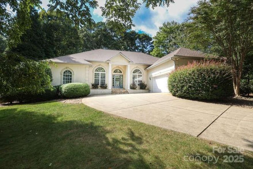 RARE Find - Deeded boat slip on Lake Norman offering lake living at its finest! You'll find the perfect blend of comfort, design, and convenience in this beautifully crafted home in desirable Sherrills Ford. Set on a spacious lot in a highly sought-after lake access community, this home offers an inviting open layout and thoughtful details that make it truly move-in ready. Featuring a bright and airy floor plan with generous living spaces designed for both everyday living & entertaining. The kitchen has gorgeous counter tops, stainless steel appliances, and a stylish backsplash that ties the space together. A large family room with a cozy fireplace flows seamlessly into dining and a 4-season sunroom, while oversized windows frame views of the private backyard. The primary is complete with a spa-inspired bathroom with dual vanities, a soaking tub, and walk-in shower. A split-bedroom floor plan and flexible living spaces provide plenty of room for family, guests, or a home office. Outdoor living shines here with a wooded backdrop, spacious deck, custom paver patio offering privacy and room to relax. A deeded boat slip adds exceptional value—perfect for enjoying weekends on the water just minutes from your doorstep. Whole house water filtration system. New Roof and Gutter Guards in 2022. Oversized garage with plenty of room for storage. Deeded boat slip #11. Prime location near new shopping, dining, and major corridors, this is more than a home—it’s a lifestyle opportunity!