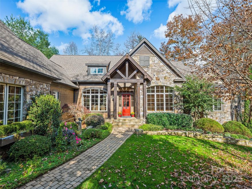 This gorgeous home sits on the waters of Powder Creek here at The Cliffs of Walnut Cove. Two outdoor fireplaces, and plenty of deck/terrace space to enjoy the outdoors. Open floor plan, with a gourmet kitchen great for entertaining. Hardwood floors throughout main. Large master suite with his/hers closets. Two interior fireplaces, and very accommodating guest rooms. A must see if you are looking for a private, mountain home in Walnut Cove!