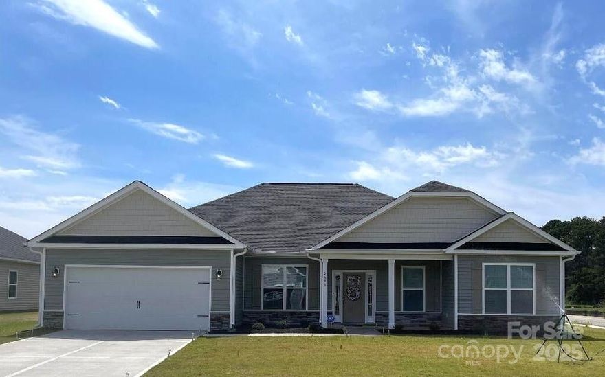 The 2239 floor plan by Adams Homes is spacious and has a well appointed layout with beautiful architectural features. The kitchen features a center island with breakfast bar and upgraded gourmet appliances. The primary is nestled away from the main living area that boasts a tray ceiling and a private ensuite bathroom. The primary bathroom features dual vanities, separate water closet, tiled shower with bench and a large walk-in closet. The additional three bedrooms are placed on the other side of the home. Step outside onto the covered deck, where you can enjoy outdoor living. The professionally landscaped yard adds beauty and enhances the overall curb appeal of the home. Coffered ceilings, window box wainscoting, gridded window panes along with all the other luxuries says it all. All packaged at $161 per square foot. Up to $5K Flex Cash is available to use towards rate buydown and pre-paids with the use of one of our 4 preferred lenders. Standard closing costs are paid by the seller.