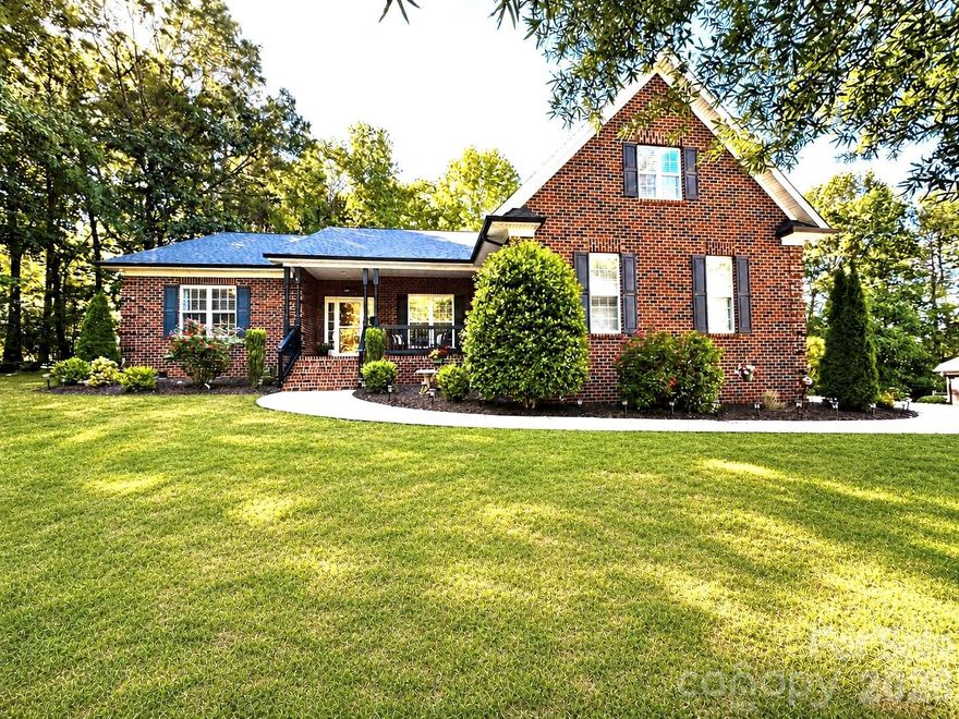 Absolutely pristine and fully move-in ready, this all-brick home in Mint Hill’s sought-after Oxfordshire neighborhood offers a rare blend of privacy, thoughtful updates, and effortless living on a beautifully landscaped half-acre lot with a private, wooded backdrop. A highly desirable main-level primary suite anchors a flexible layout that includes 3 bedrooms, 2 baths, a private office with French doors, and an expansive bonus room that lives larger than expected. The open great room flows seamlessly into a bright, updated gourmet kitchen (2018)and breakfast area featuring granite countertops, tile backsplash, stainless steel appliances, and a built-in desk , creating a functional and inviting heart of the home. Interior highlights include quality flooring, fresh paint, generous storage, and a floored pull-down attic, while the primary suite offers a tray ceiling and dual vanities. Thoughtful additions such as a tiled laundry room, storm doors, water softener, Blink security system, powered detached shed, and oversized two-car garage enhance everyday convenience. Major improvements—including a new roof (2023), new main-level HVAC (2025), tankless water heater, updated thermostats, and full home replumb—provide lasting peace of mind. Outdoor living is equally compelling with a covered front porch and a refurbished rear deck designed for relaxing or entertaining in a serene natural setting. Exceptionally low $125 HOA. A rare, turnkey opportunity. Seller is a licensed Broker.