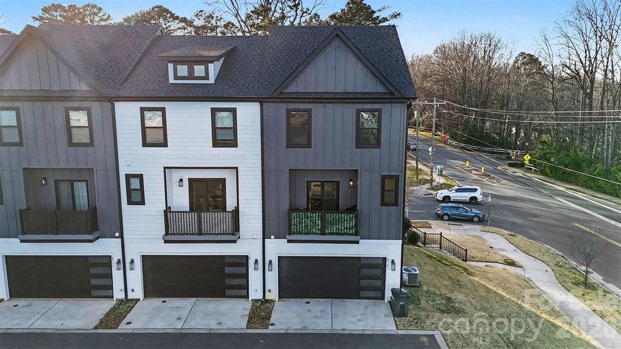 Like-New end-unit townhome in the heart of Charlotte! This modern 4-bedroom, 3.5-bath home features LVP flooring throughout most of the home and an abundance of windows that flood the space with natural light. Ideally positioned within the community, it truly shows like a model home. The main living level offers a stunning kitchen with a large center island, quartz countertops, stainless steel appliances, and a white subway tile backsplash that ties the space together beautifully. The kitchen opens directly to the spacious living and dining areas, with easy access to the outdoor balcony—perfect for entertaining or relaxing. Upstairs, the primary suite showcases peaceful views, a tiled shower, a dual-sink vanity, and walk-in closet,. Two additional bedrooms and bathroom and laundry complete the upper level. The lower level offers a private guest suite with an en-suite modern bathroom. Enjoy ample parking with a 2 car garage and easy access to the neighborhood guest spaces directly across. This location is hard to beat—ideally located with easy access to Southpark, Matthews, or uptown Charlotte and conveniently located right off Hwy 74. No rental restrictions, can also be used as an income producing property!