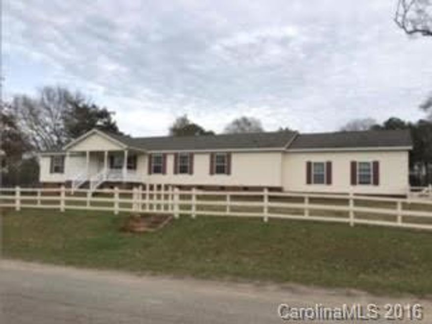 Excellent one story Ranch with 4 bedrooms and 3 full baths. Very well maintained with a front porch. 1.8 acres homesite with two cars garage. Inside you will find a large kitchen with an island, plenty of cabinets an electric cooktop. Generous master suite with a sitting room/office. Country Living, this Rural Tract of land offers a Detached Barn&shed (Sold As Is) offers an abundance of opportunity. Bring your own farm animals because there are No Restrictions.