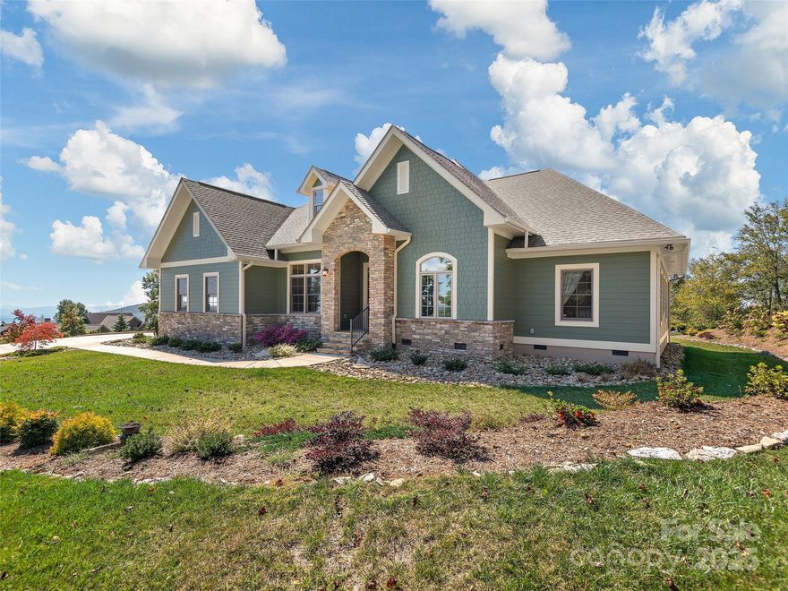 A "Mountain Manor" Reimagined for Modern, Manageable Living!

This immaculate, SINGLE~LEVEL mountain-farmhouse blend is privately tucked off the main road on a full acre of gentle, usable yard space...offering the rare opportunity to enjoy both sunrise and sunset vistas from different perspectives.

The spacious, open floor plan is mindfully designed for effortless flow, connecting the epicurean eat-in kitchen to the great room which features soaring windows, a stone fireplace, and seamless access to the covered outdoor living space which showcases expansive views of the western Blue Ridge Mountain Range.

The ensuite primary bedroom and bath offer privacy and comfort with age-in-place design elements such as wide doorways, elevated counters, and a zero-entry shower.

The beautifully appointed chef’s kitchen highlights stunning quartzite counters, an oversized island with comfortable seating for 4, a 6 burner gas range with pot filler, farmhouse sink, extended cabinets with back lighting and glass doors, and a generously proportioned butler’s pantry with custom cabinet storage and a full sized second refrigerator.  Additional home highlights include hardwood floors, tankless water heater, 22kw Generac generator, whole-house surge protection, SimpliSafe system, LeafFilter gutters, coated garage floor, and transferable warranties. Home is offered fully furnished. 

Only two years young, this practically new mountain top gem is an absolute MUST SEE!