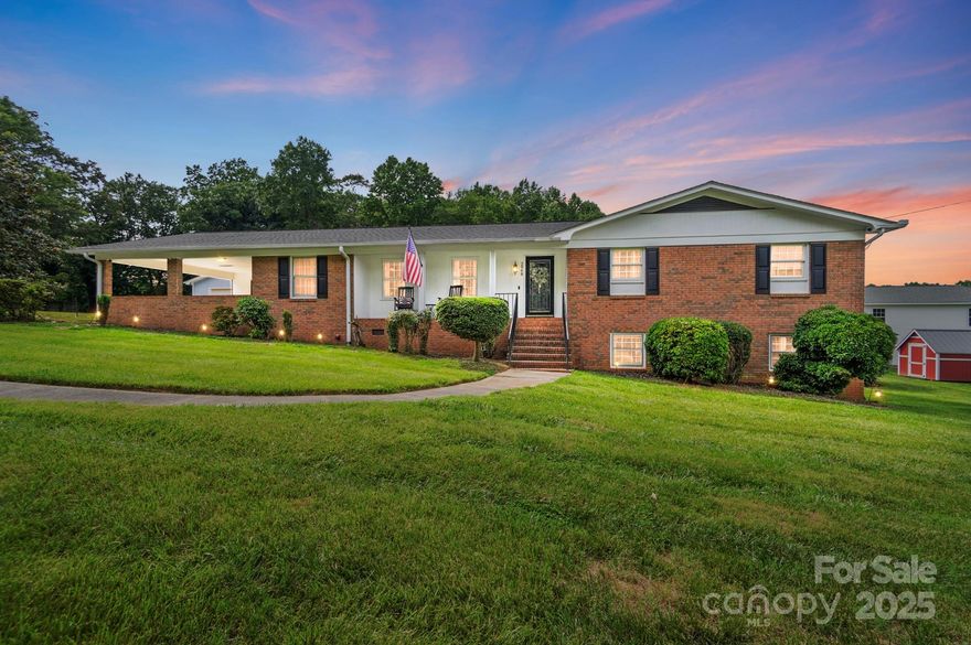 Summer's almost here- imagine beating the heat in this meticulously maintained home floating in the in-ground pool. Wonderful brick home on .72 acre lot.  Featuring walk out basement to pool area.  Basement entertainment area features rec room with wet bar and full bath. Upstairs, two large living areas, kitchen with nearly new appliances and ample cabinets, formal dining room as well as eat-in kitchen, master suite and two additional bedrooms. Mature and lovely landscaping. Carport and additional detached garage allow for ample parking and flexible use for projects. Conveniently located in a wonderful neighborhood that is quiet and also near services. Minutes to I40. Roof replaced 2020, pool liner 2018, crawlspace was waterproofed 2020, water heater 2020, exterior painted 2020, kitchen appliances 2023, HVAC approximately 9-10 years old.  Property in great shape, don't let this one get away.
