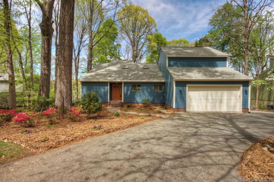 Spacious updated 3 story LKN waterfront home w/modern, quality & styling top to bottom! Great entertaining on the main floor w/a desirable open floor plan, lg kitchen w/ high end appliances & an elegant formal dining space w/walkout to the screened porch overlooking deep water. Use one of two staircases to access each of the master suites on the upper level connected by a charming loft area. Plus a fabulous finished walkout bsmt with a stunning wet bar, media room & workshop! A must see.