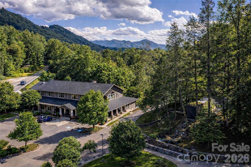 Where mountains hold their breath and history runs as deep as the river below, Nantahala Village Resort has been a place apart since 1948. Sun-warmed porches, woodsmoke evenings, and mornings so quiet above the Nantahala Gorge, all of it held with 95 acres between two national forests in the heart of the Great Smoky Mountains. Eleven lodge rooms, 3 lodge cabins, Outfitters Cabin and 2 newly constructed 2 story homes each carry the character of a place built over generations. Total of 11 lodge rooms, 2/3BR, 2/2BR, 2/1BR Cabins (total sleeping capacity 58) Barn/Stables, Open Air stables, Tack/Room Office, Open Air Instruction Pavilion and plenty of places to ride! Pond for fishing & paddling. Swimming Pool, Game Room, Gym, Summer Concession Center, Two Outdoor Event Deck Overlooks, Retail/Ice Cream Shop, Casual Outdoor Bar/Restaurant known for lively entertainment (Only full liquor license in the entire Gorge area), Outfitters cabin with Training Pavilion, Farmer's Market Pavilion, Tennis and Basketball courts, Historic Rock Fire Tower Waterfall and the Kallisto Restaurant and Lounge keep the days as full or as unhurried as the property demands. Short five-minute easy hike to a sandy beach along the Nantahala Gorge. Site plans for 52 luxury condominiums and 140-plus residential lots position the next owner to write and entirely new chapter on one of the most storied parcels in the Southern Appalachians.