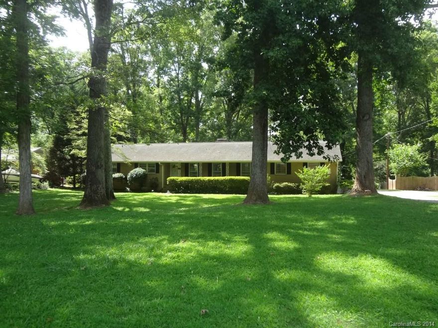 Full brick ranch w/ basement on .75 acre lot in quiet, non-HOA neighborhood.  Home has detached 3+ car, wired garage.  Enter through front door into slate floored foyer, formal dining & living rooms.  Family room/den w/ glass log fireplace.  Nice sized bedrooms w/ overhead lighting. Basement has bedroom w/ 1/2 bath & large rec area w/ second gas log fireplace. This home is priced based on the amount of cosmetic updating required. Fabulous opportunity for you to make this gem your home. Warranty!