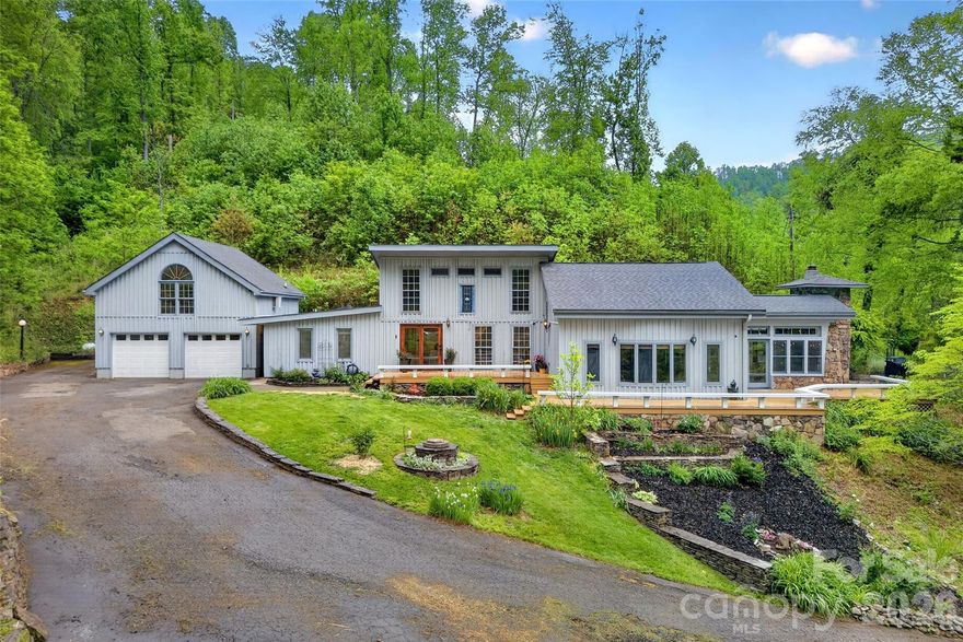 Welcome to 3068 Hwy 226 — a truly one-of-a-kind mountain retreat set on over 16 unrestricted acres, where timeless architecture, privacy, and functionality come together. Inspired by Frank Lloyd Wright and designed as a passive solar home, this property offers a unique floor plan filled with character and warmth— the kind of home that naturally becomes the gathering place for holidays, dinner parties, weekend guests, and unforgettable evenings with friends and family.

Originally built in 1980 with thoughtful additions completed in 2006, the home features three bedrooms and four bathrooms along with flexible living spaces designed for both everyday comfort and entertaining. The beautifully renovated 2025 kitchen showcases quartz countertops and updated finishes that blend seamlessly with the home’s architectural style.

Outside, the property feels like a private mountain sanctuary while remaining conveniently located right off Hwy 226. Two separate driveways provide easy access and added flexibility. The detached workshop offers excellent space for hobbies, storage, or creative projects, while the two-car garage includes living space above — ideal for guests, a private studio, multigenerational living, or passive income potential.

The grounds are equally impressive, featuring gorgeous peonies, roses, Japanese maples, established gardening space, and peaceful natural surroundings. Spa hookups are already in place for a future hot tub addition.

Enjoy the rare combination of privacy, acreage, and convenience with easy access to the Appalachian Trail and Johnson City, making this property an exceptional full-time residence, mountain getaway, or investment opportunity.