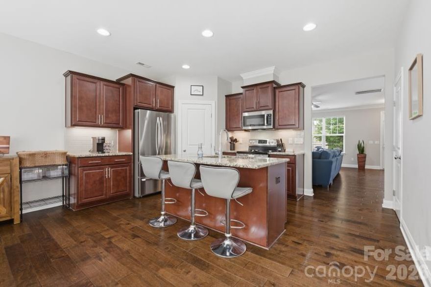 RARE FIND with a SECRET ROOM & DETACHED GARAGE! Experience the perfect blend of modern luxury and functional design in this stunning 2018-built sanctuary. The heart of the home flows seamlessly, but the real showstopper is the primary suite: featuring a dual-point spa bath, oversized walk-in closet, and a versatile 'secret room'—the ultimate private executive office, nursery, or dream dressing room.

Need storage? The spacious detached garage provides ample room for a workshop, gym, or hobbyist’s haven. Life stays organized with a dedicated rear drop zone and an oversized laundry suite. Step outside to your private oasis featuring a designer pergola and concrete patio, ideal for sunset cocktails. This is turnkey living at its finest—luxury construction without the new-build wait or price! Don't forget about what this home has that a new build might not have: custom designer pergola, the detached garage layout, and the fact that the window blinds, refrigerator, and yard landscaping are already completely established and turned over!  Don't pass this one by, give it a look and see for yourself!