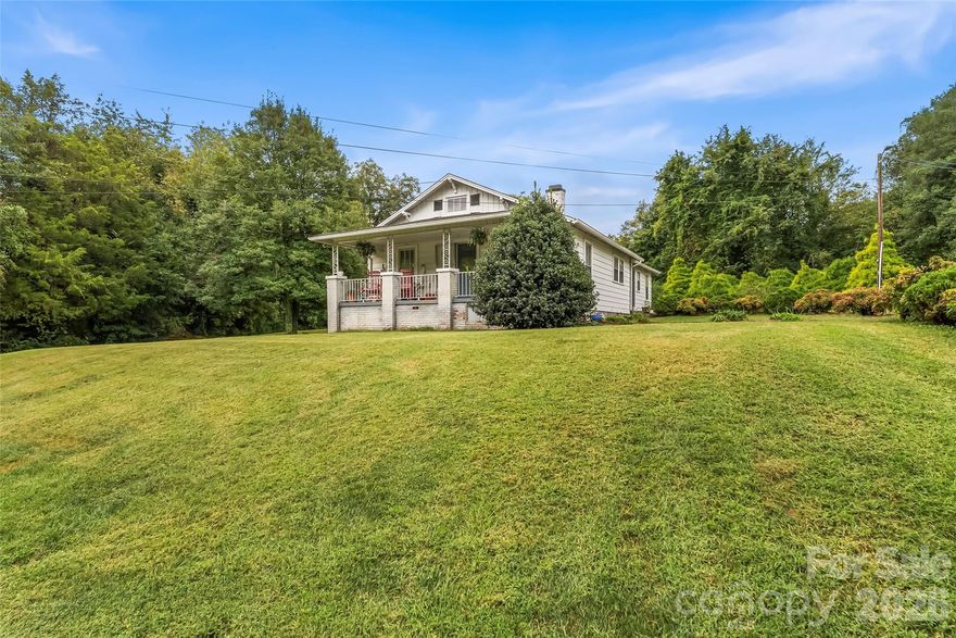 Welcome home to this inviting bungalow filled with character and comfort. Step inside to find beautiful hardwood floors and spacious living areas. Enjoy your morning coffee on the welcoming front porch or unwind by the fire pit in the backyard after a long day. This home features large bedrooms and generously sized bathrooms and lots of closet space, offering plenty of room for everyone. New HVAC replaced in 2025, with 10 year general warranty transferred to new owner. The circular driveway provides convenient access and ample parking, while the outbuilding adds extra storage. Move in Ready !