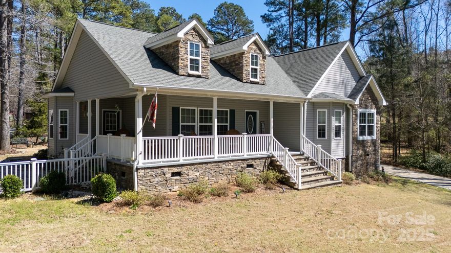 Beautifully constructed home nestled on an acre of land in the country side of Catawba, just minutes from Rock Hill. This custom home features a huge primary bedroom with a custom bathroom, walk in closet, and an attached flex space great for an office, nursery, or additional walk in closet! Enjoy the peaceful surroundings from the covered back porch or the desirable wrap around front porch. There is parking for an RV with a tap into the well, and a storage shed in the back yard. This home has it all!