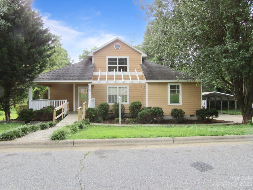 In town location close to all major roads and schools. New heat pump has been installed. 3 bed and 2 bath home with large bonus room above. Lots of storage. Double detached carport and Single metal detached garage with double doors. Large back deck.