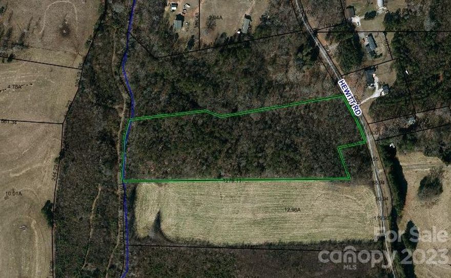 Fantastic opportunity for country living.   11.05 wooded acres of privacy.   Stream on back of property.  Centrally located for convenient access to the greater Charlotte metro area, Newton/Conover area and to Hickory.  Must see if you are looking for that private setting!