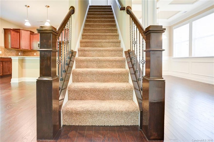 NEW Community, upgraded kitchen with granite, ceramic tile backsplash, Stainless appliances, recessed lighting, island, pendant lights, built in fridge cabinetry, crown moulding on cabinets.  Master bath has dual sinks, garden tub and shower