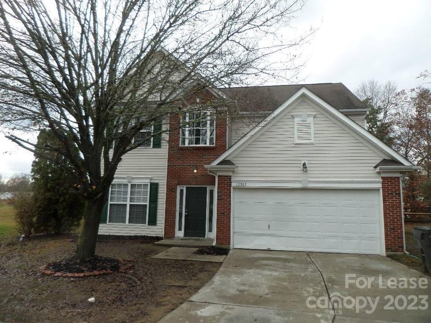 Remarkable, 5 BR / 2.5 BA 2-story home with 2-car garage in cul-de-sac!  And it's just been updated- new paint & carpet!  New kitchen floor opens up to breakfast nook with tons of natural light.  Great room has stylish wood laminate flooring with a gas fireplace and backs up to a formal dining room with chandelier.  Downstairs 5th bedroom would work great as an office, play room, or extra bedroom.  Upstairs master bath boasts dual sinks, walk-in closet, separate shower, & garden tub!  Enjoy the outdoors with a huge fenced-in backyard with patio.  Great location- minutes from Concord Mills Mall (with all its surrounding restaurants and entertainment!) Concord Motor Speedway, and all major freeways- only 20 minutes to Uptown.  Most pets OK.  Inlivian OK.  Available Now!