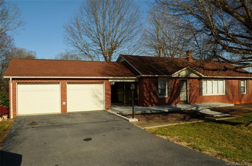 Older brick house with 3BR/1.5BA full basement. Paved drive, 30x36 building for extra storage, or garage in addition to the double garage in the house. Hardwood, tile, carpet, replacement windows, all appliances. Start the day sitting in the breezeway with your favorite coffee.