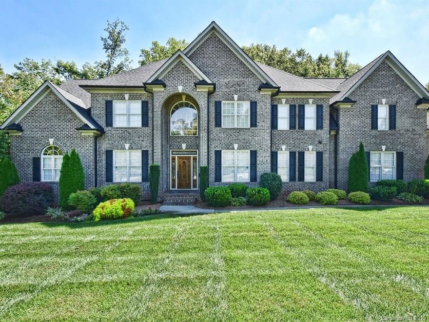 Welcome to the established community of Whispering Winds! This suburban setting offers peace and tranquility while being just minutes to popular destinations like Afton Ridge and Concord Mills! The mature landscaping and all brick exterior offers a great first impression and with just under 6,000 heated square feet there is plenty of space to live and entertain! Complete master suites on main level and upper level and upgrades like granite, stainless steel and hardwoods make this a must see!