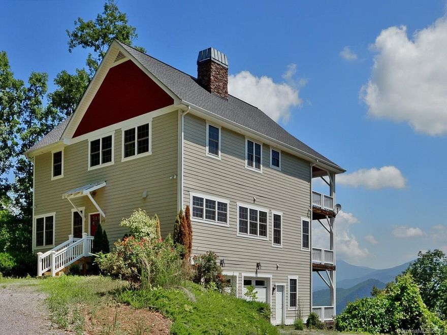 Top of the world views! Gorgeous arts and craft style with open floor plan. Views from every room, 3 fireplaces, oversized garage,Spacious rooms thru out.3 covered decks with ceiling fans to enjoy the beauty. Master suite boast 3 Sets of French doors and a FP. If you are looking for views ,privacy and a beautiful home, this is it.