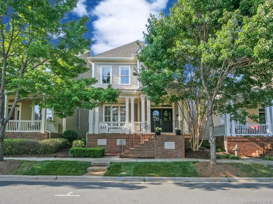 Updated and move-in ready!  Rocking chair front porch.New interior paint, new kitchen alppncs, new granite/tile bcksplsh in ktchn w/ oil rubbed bronze hardware.  10' ceilings on main level.  Open plan, H/W floors on main. Only plan with covered back porch. Lrg mstr suite with dual walk-in closets. Lrg 2ndry bedrooms. Fncd bck yard w/ patio and 2 car detached grg.  Walk to upscale shopping/dining/entertainment.