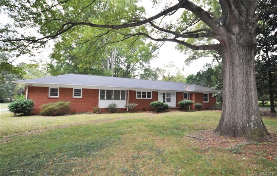 Location, location, location! Great home with large lot and mature shade trees. Lovely home with lots of character. Hardwood floors throughout, kitchen cabinets refaced, ceramic tile back-splash and counter-tops, washer and dryer hook ups on the walls. Freshly painted inside and ready to move in!