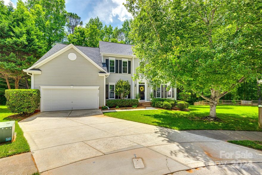 Welcome to Cardinal Woods! Nestled in a tranquil cul-de-sac in the heart of Pineville, this meticulously cared-for 4-bedroom, 2.5-bathroom home offers the perfect blend of comfort and elegance. The kitchen is a chef's delight, featuring beautiful granite countertops, abundant storage, and high-quality appliances. Cooking for anyone is a breeze with your electric oven/stove, and additional wall oven! Hardwood floors run throughout the home, adding warmth to every room. The open floor plan creates a seamless flow from one space to the next, perfect for modern living. Enjoy the large, private lot with a fenced-in backyard. Upstairs you'll find your primary bedroom with en suite bathroom that has a heating fan to ensure warmth, and controlled heated floors. Cardinal Woods will be zoned for the new Ballantyne Ridge High School starting in fall of 2024. Located in close proximity to The Bowl in Ballantyne, and the light rail, this home is close to shopping, dining, and entertainment options.