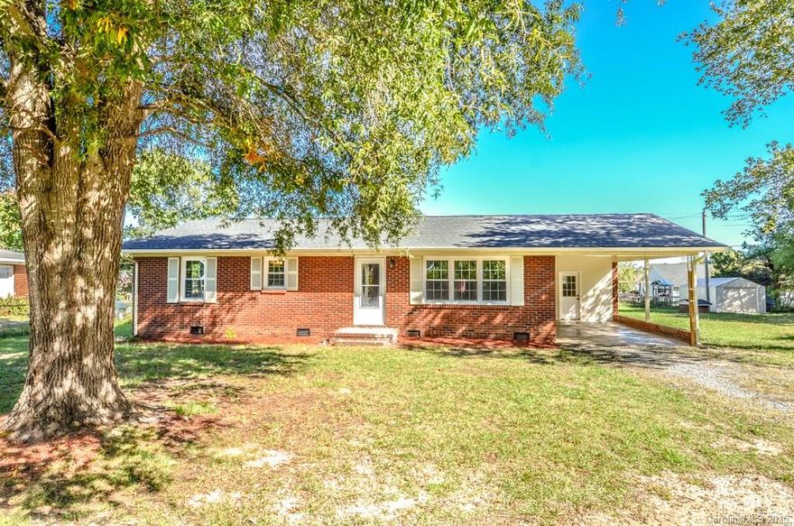 Updated 2 Bedroom/1 Bath full brick ranch home in the heart of Indian Trail - Union County! Home sits at the end of a quiet street on .52 acres of land. New flooring/carpet, fresh paint, new cabinets, granite counter tops, new appliances, new light fixtures. Exterior features storage building, carport, laundry and gravel driveway with extended parking. Move in ready home with beautiful neutral finishes.