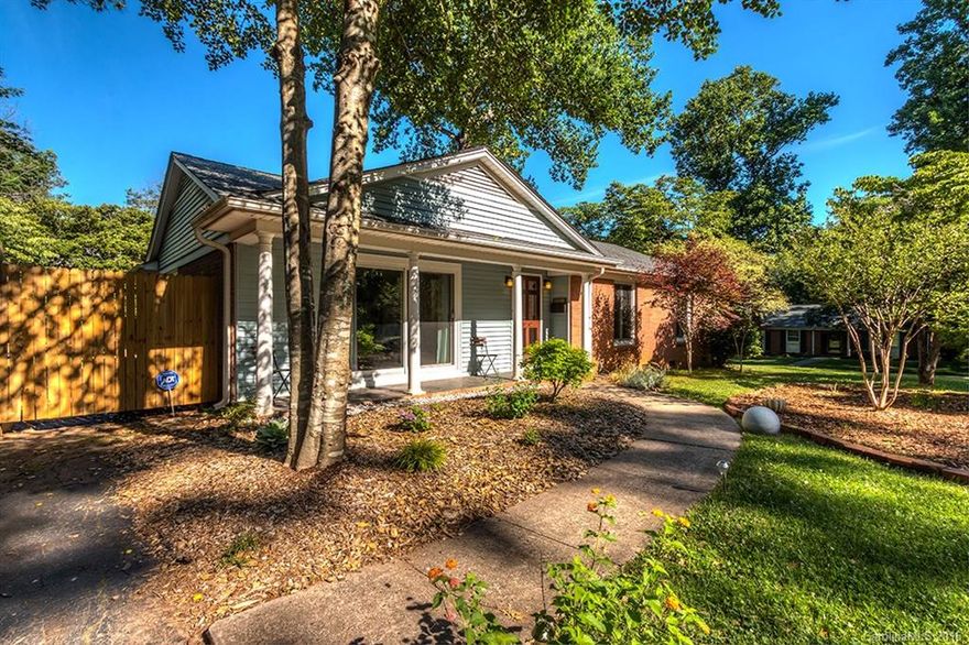 Style and Function in hot Coventry Woods. This house is HAPPY! Gorgeous hardwood floors, new windows + sliding glass doors and high efficiency furnace. Check out the slick new kitchen with butcher block countertops and open shelving is open to the dining room. You'll love the private den with beamed ceiling and a masonry fireplace.The hall bath has been updated with penny tile, glass subway tile and new fixtures! Three nice size bedrooms too! All located on one of Coventry Woods nicest streets.