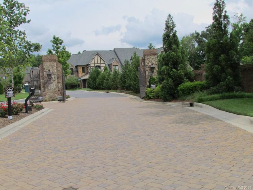 Best value in town! This gated development is in a class of its own. Top of the line std finishes characterize this brick & stone townhome. Features include site finished hardwood floors, custom cabinetry, 42" built ss refrigerator, built-in cabinetry in great room, Bosch stainless appliances, granite counter tops, 10' ceilings down/9' up, custom shutters throughout, fireplace, two-car attached garage, and private rear yard. Finished bonus room (with the exception of carpet or hardwood flooring)