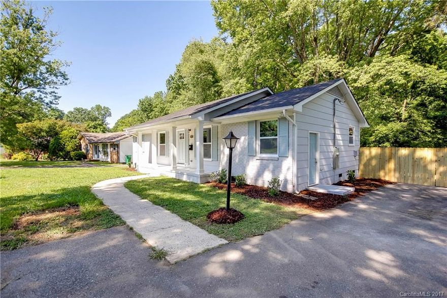 Completely updated minutes from Midwood and Noda! New GAF Architectural  Roof, New Ductwork, New hardwood floors, New Kitchen with stainless steel appliances, shaker cabinets and mykonos quartz counter tops, 2 new bathrooms (new toilets, bath tubs/shower, vanities, tile and plumbing), new light fixtures, new electric panel and wiring, new privacy fence, new deck...Come see this home in Windsor Park and fall in love!