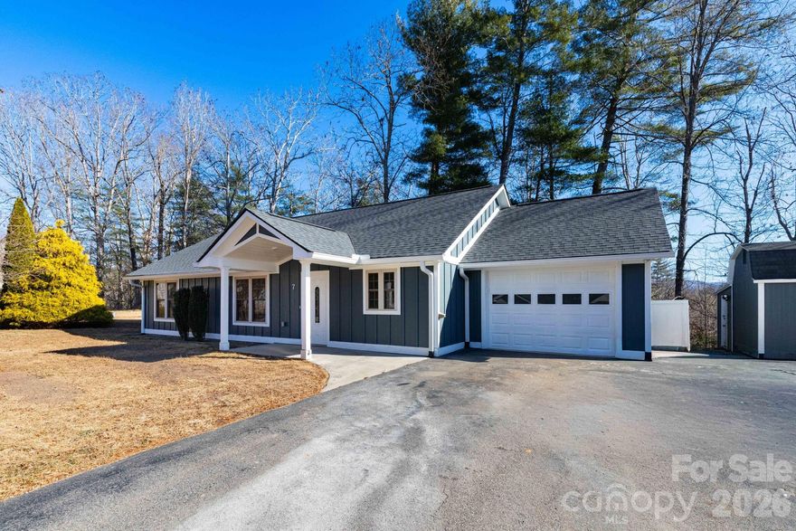 Nestled on just under half an acre on a peaceful Fairview cul-de-sac, this beautifully remodeled 3BR, 2BA home offers a perfect blend of comfort, convenience, and mountain charm. Step onto the spacious covered back porch and soak in the serene backdrop—an ideal spot for rocking chairs, morning coffee, and quiet mountain views. The back deck is perfect for grilling, relaxing in the sun, and hosting gatherings, with space for kids and pets to play in the yard. Inside, enjoy one-level living with thoughtful updates throughout. Outside, a fire pit adds a cozy touch for evenings under the stars, and extra parking makes room for friends and family. Two spacious storage buildings offer excellent flexibility for office space, a workshop, or a home-based business. The first building is approximately 10×10 and features a 7-ft ceiling, rafters, and a metal roof. The second building is roughly 12×16 and includes two additional attached structures, equipped with electricity. Convenient to Asheville, Hendersonville, Arden, and Lake Lure. This home is also convenient to Fairview and Cane Creek schools. Best of all, there’s no HOA, giving you freedom to make the space your own. A welcoming neighborhood and peaceful setting make this home a standout—a Fairview haven designed for warmth, connection, and outdoor living.