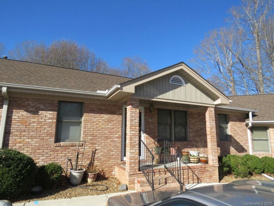 Ground level condo features vaulted ceilings, lot of storage space, neutral paint, plantation blinds, tile floor bathrooms, nice rear deck area, matching stainless steel appliances, and good size master bedroom with walk-in closet - Make this your Home today.