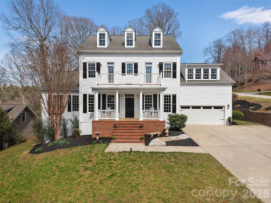 This classic Biltmore Park home delivers something rare in this section of the community: a level, usable yard with a deck and meaningful outdoor space to enjoy the surrounding nature. Inside, it just gets better! The open floor plan is generous and effortlessly connected, with a main level primary suite, large kitchen, and three additional bedrooms upstairs. The finished basement adds a spacious family room and bonus room - and ample storage for your seasonal items. All the bathrooms have been remodeled, and a balcony with westerly views rounds out the package beautifully. Just down the street, the Biltmore Park Town Square is at your fingertips: upscale dining, outdoor cafes, excellent fitness venues, a 15-plex theater, and a seasonal farmers market, while three miles of greenway trails connect you to the pool, clubhouse, tennis/pickleball courts, and playground. Outstanding K-12 schools just minutes away. Exceptional space, a yard you can actually use, and Asheville's finest community - this gorgeous home awaits the buyer eager to spread out!