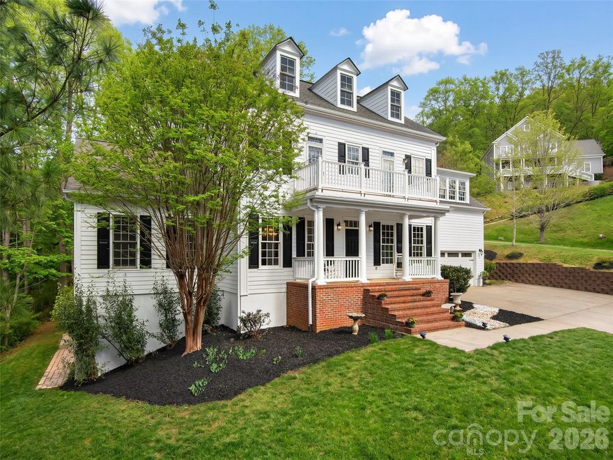 This classic Biltmore Park home delivers something rare in this section of the community: a level, usable yard with a deck and meaningful outdoor space to enjoy the surrounding nature. Inside, it just gets better! The open floor plan is generous and effortlessly connected, with a main level primary suite, large kitchen, and three additional bedrooms upstairs. The finished basement adds a spacious family room and bonus room - and ample storage for your seasonal items. All the bathrooms have been remodeled, and a balcony with westerly views rounds out the package beautifully. Just down the street, the Biltmore Park Town Square is at your fingertips: upscale dining, outdoor cafes, excellent fitness venues, a 15-plex theater, and a seasonal farmers market, while three miles of greenway trails connect you to the pool, clubhouse, tennis/pickleball courts, and playground. Outstanding K-12 schools just minutes away. Exceptional space, a yard you can actually use, and Asheville's finest community - this gorgeous home awaits the buyer eager to spread out!