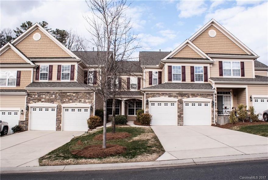 AMAZING TOWNHOME in BEAUTIFUL TEGA CAY.
 Covered Porch opens to Rich Hardwood Floors on Main. Carpet in Great Room 
Open Floor Plan is Great for Entertaining; 2 Story Cathedral Windows. Private patio backs to woods, or as owner says"Wildlife Habitat". Gas Fireplace, Gourmet Kitchen, Granite, Tile, Beautiful Cabinetry, Large Master with His & Her Closets, Shower & Garden Tub, Dual Sinks. Lots of Natural Light & 2 Car Garage.
Come Home to this and MORE at 1057 Silver Gull Drive.