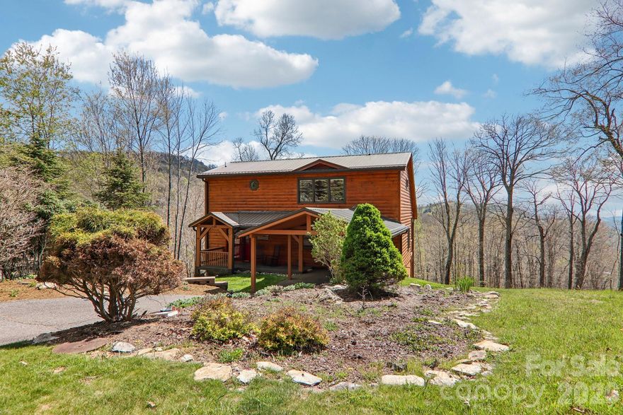 186 Cottage Lane is tucked into one of the most desirable settings in Wolf Laurel, offering a rare blend of privacy, long range mountain views, and easy access to the best of mountain living. Set in the shadow of Bald Mountain, this beautifully updated home captures the essence of an elevated mountain retreat with the comfort and convenience buyers are looking for today.
Originally built in 2001 and recently remodeled, the home features new carpet, updated appliances, granite countertops, three renovated bathrooms, an updated deck, and inviting living spaces filled with natural light. Turn key and offered fully furnished, this home is ready to enjoy from day one. Inside, expansive windows frame the surrounding mountain scenery, while hardwood floors, warm wood ceilings, and a striking stone fireplace create a welcoming gathering place for quiet evenings, family visits, or weekends away.
With three levels of living, four spacious bedrooms, and four baths, the home offers excellent flexibility for hosting guests, creating private retreats, or accommodating full time living. Generous outdoor spaces make it easy to relax, entertain, and take in the crisp mountain air. A large lot and covered entrance add ease and function for year round enjoyment, while propane heat provides efficient comfort through the cooler mountain seasons.
The location is exceptional. You are just minutes from Wolf Laurel amenities, including the clubhouse, fitness center, golf course, hiking trails, and the exciting new Hatley Pointe ski area with year round dining at Smoke and Timber. An Equity Village Club Membership conveys with the sale, with the buyer to pay the transfer fee. Optional Wolf Laurel Country Club membership offers access to the acclaimed golf course, fitness center, restaurant, and bar.
Wolf Laurel is known for its natural beauty, gated mountain setting, and access to outdoor adventure. Enjoy miles of internal hiking trails, multiple community access points to the Appalachian Trail, nearby skiing, and the planned downhill bike park at Hatley Pointe coming in spring 2026. Everyday conveniences are close by in Mars Hill, Weaverville, Burnsville, Asheville, and Johnson City, giving you the perfect balance of seclusion and accessibility, with both Asheville and Johnson City offering regional airport access.
Whether you are searching for a full time residence, vacation getaway, or investment opportunity, 186 Cottage Lane delivers the best of Wolf Laurel living in one of Western North Carolina’s most sought after mountain communities. Come see why Wolf Laurel is known as the Jewel of the Blue Ridge Mountains.