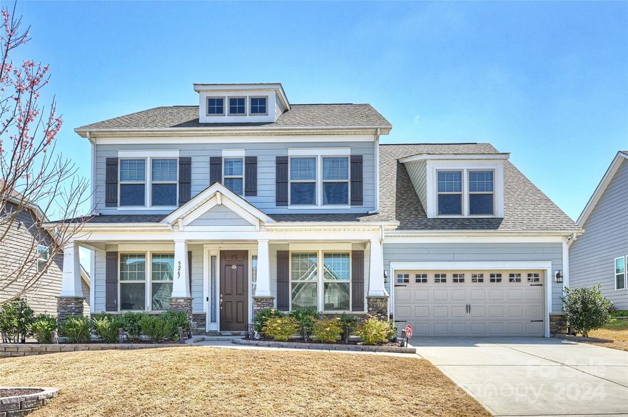 Luxury living awaits in The Overlook at Barber Rock! This impeccable estate home boasts stunning curb appeal with stone accents and a covered porch. With 5 bedrooms and 4.5 baths, including a main-level bedroom suite, there's ample space for everyone. Gourmet chef's kitchen with granite island, SS appliances, and tiled backsplash. The Great Room features a fireplace, while the primary suite offers a spa-like bath and custom closet. Each secondary bedroom has a Jack and Jill bathroom. Huge rec/bonus room perfect for entertainment. Work from home in the study/office with French doors, and enjoy the sunroom year-round. Enjoy modern conveniences like a tankless water heater, whole house water filtration system, Ring doorbell, and security cameras. Enjoy outdoor living on the paver patio. Adorned with stunning contemporary fixtures throughout. Premium lot in a tranquil private street, located near Ballantyne and I-485. Don't miss out on the opportunity —schedule your showing today!