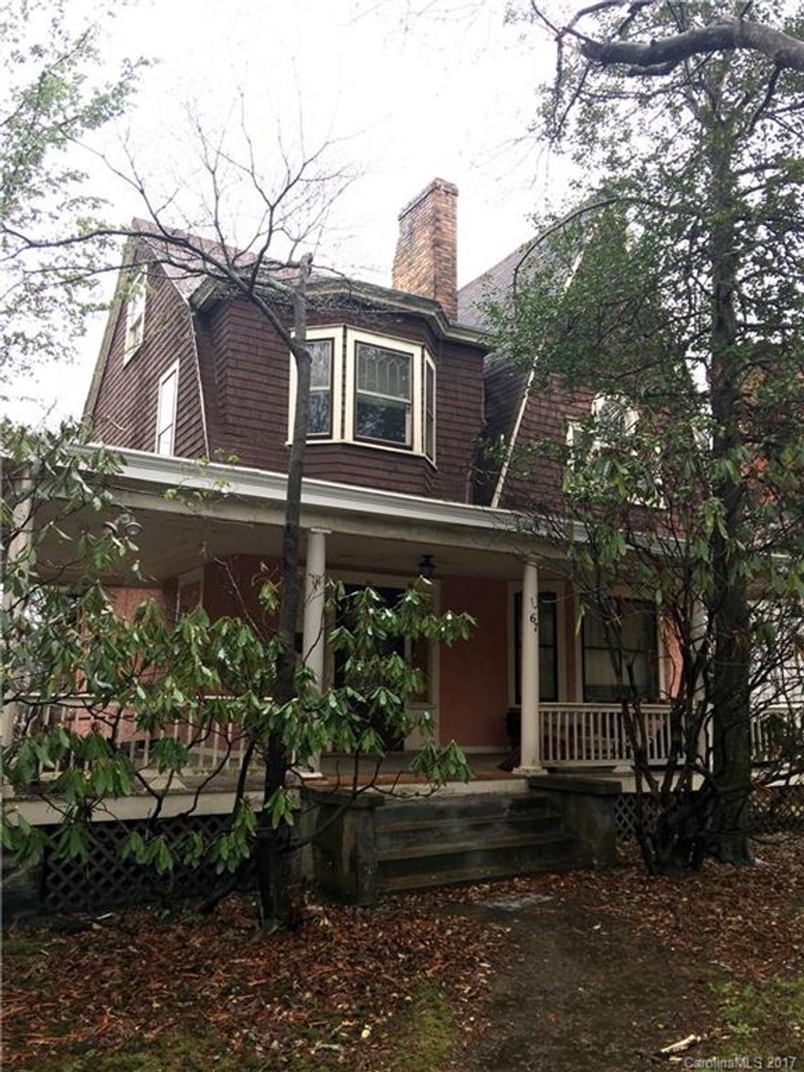 No Showings until May 1, 2017.  Beautiful example of the historic gothic revival in Montford. Opportunity to participate in the restoration of this important and desirable home in a historic community. Home features oil steam furnace (maintained annually), decorative ornate cast iron radiators. 3 victorian ceramic tile fireplaces. Large level yard. Exterior includes pebble dash walls, cedar shakes. Walk to Asheville, shops, historic Grove Arcade.