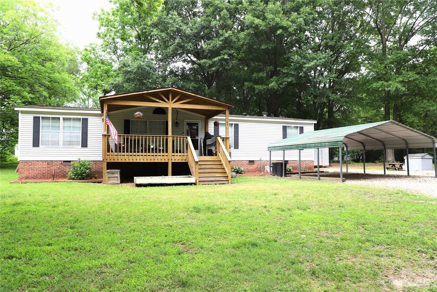 This charming 3 bedroom 2 bathroom home is looking for it's new owners! The home boasts 1500+ sq. ft. +/- of living space, providing ample room for all of your needs. New porch was built in 2021 and is the perfect place to relax any time of year. The roof and HVAC system was replaced in 2014. This home has many joyful memories with it's current owners and ready to make more with you!