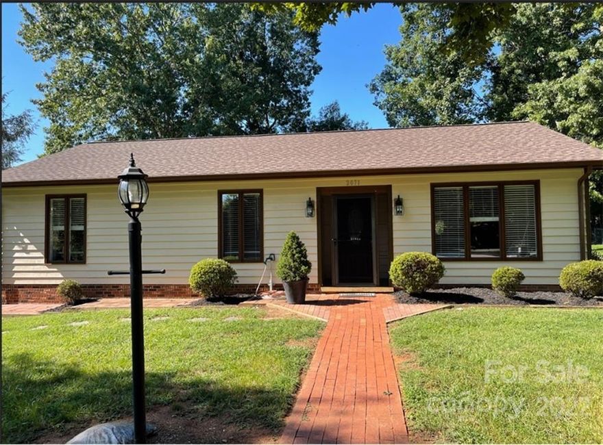 This meticulously maintained 3 bedroom 2 bath home has an open floor plan and features beautiful luxury vinyl plank flooring in the main living areas and hall bath. There are three spacious bedrooms with generous closet space. The updated kitchen features stainless steel appliances, tile backsplash and a farm sink. The kitchen leads to an updated all-seasons room where you can relax and enjoy looking at the spacious back yard. The oversized double garage is a handyman's dream with lots of shelving and space. This corner lot offers plenty of room for outside activities. Roof replaced in 2020 and HVAC replaced in 2017.