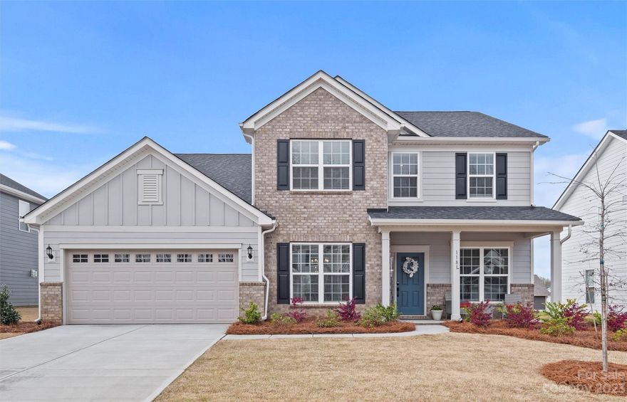 Loaded with upgrades, this beautiful home was built in 2022 & shows like new.  Open & bright with an office for working from home.  Butler's pantry! Kitchen Aid appliances, a five-burner gas cooktop, quartz countertops & large pantry & island.  Large covered patio ready to be converted into a screened porch or to a sunroom; it extends on both sides for enjoying the expansive backyard lined with trees.  A guest suite with full bath on the main.   Upstairs loft for relaxation.  The large primary suite boasts wood floors, a large walk-in closet and a spa-like bathroom, oversized shower with rain head & upgrades galore.  Tankless water heater, nest thermostat, smart lock, smart garage & boosted WIFI.  Community pool with cabanas, clubhouse, playground, pocket parks.  This home is still within the transferrable Pulte 10 yr warranty including 1 year for workmanship. Low taxes, convenience to schools, shopping, and restaurants. Minutes to Ballantyne and just 30 minutes from Uptown Charlotte!