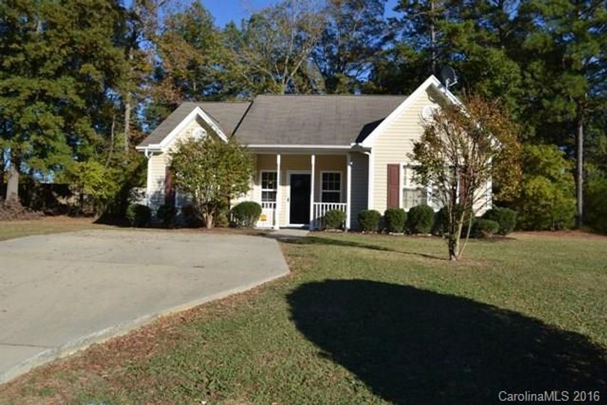 What a dollhouse! Enjoy your cup of tea from the rocking chair front porch or from patio in the private back yard. This home offers a cozy kitchen with dining area, and vaulted living room has a gas log fireplace to keep you warm this winter.  Makes for a lovely first home or investment property.