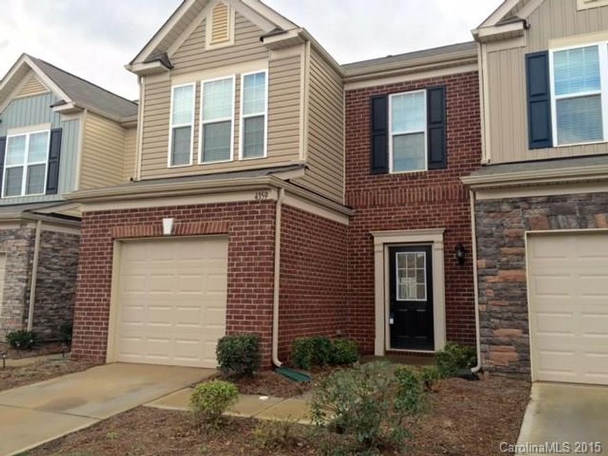 Nearly new townhome with a lot of upgrades.   This 3 bedroom/2.5 bathroom boasts hardwood floors on the main level, granite counter tops and stainless steel appliances.  Master bedroom has a tray ceiling and custom built shelving in the walk-in closet.   Community features club house with Olympic-sized pool and gym.