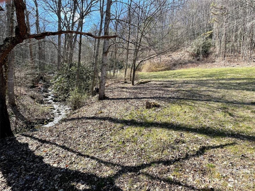 Escape to this magnificent 21-acre private property, perfectly secured by the surrounding mountainside to ensure unparalleled seclusion and tranquility. The property features approximately 3 cleared acres of gently rolling terrain, providing an ideal, scenic setting for a luxury home or rustic cabin.

All essential infrastructure is already in place, making this parcel ready for construction: a durable **cement pad** awaits your custom-designed residence, and both a **septic system** and a **private well** have been installed.

Adding to the land's unique charm and utility, it boasts a pre-existing outdoor amenity: a brick chimney used for cooking. This is more than just land; it is a ready-made foundation for your private mountain sanctuary.