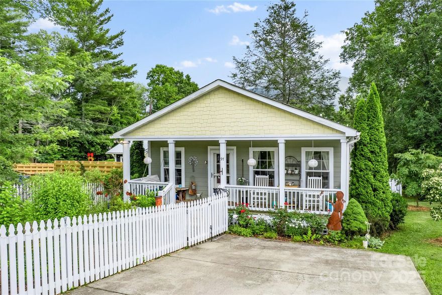 Set in a friendly, established neighborhood just one mile from downtown Black Mountain with vibrant shops, breweries, live music, and Tomahawk Park’s many outdoor activities for food, fun, and nature. This attractive and well-maintained 3BR/2BA Black Mountain home was built in 2013. Refreshingly airy and modern interior gets beautiful natural light, with spacious rooms that invite relaxation and connection. Open-concept kitchen, dining, and living area is perfect for entertaining. Newly added durable, stylish laminate floors throughout the home. Enjoy views of the mountains from the front and back, and take in the sunset from the covered front porch, complete with a classic swing and rocking chairs. The English cottage perennial garden is established and care-free, and there are veggie and herb beds in place. Both front and back yards are fenced for peace of mind. Less than 20 minutes to Downtown Asheville. Choose this calming, comfortable, and cared for home!