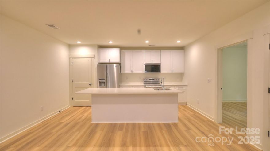 Beautiful New Construction Basement Home for Lease! Enjoy the best of modern living in this brand-new home with a bright, open floor plan and high-end finishes throughout. Featuring three spacious bedrooms and two full bathrooms, this home offers plenty of space for comfortable everyday living.  The primary suite includes a private ensuite bath, while the oversized secondary bedrooms share a stylish Jack-and-Jill bath with hallway access — perfect for families, roommates, or guests.You’ll love the chef’s kitchen with its large island, stainless steel appliances, and quartz countertops — ideal for cooking, entertaining, or just enjoying your morning coffee. The open layout connects seamlessly to the living and dining areas, creating a welcoming space to relax or gather.   This home offers modern design, convenience, and comfort — everything renters are looking for in a new place to call home. Now accepting applications — contact the listing agent today to schedule your private showing!  Check out our virtual tour at https://my.matterport.com/show/?m=wsPV1EtQeWX&brand=0